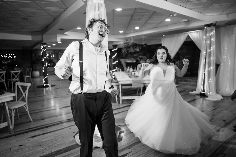 Wedding reception candid, full of laughter